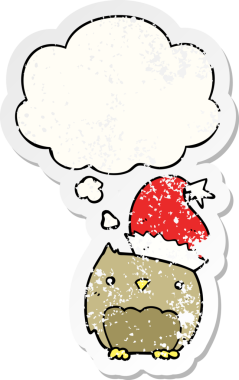 Düşünce baloncuğu olan sevimli noel baykuşu bir insan tarafından çizilmiş yıpranmış bir çıkartma.