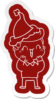 Bir insan tarafından çizilmiş Noel Baba şapkası giyen, gülen bir çocuğun garip çizgi film etiketi.