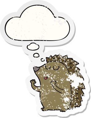 Düşünce baloncuğu olan çizgi film kirpisi insan tarafından çizilmiş yıpranmış bir çıkartma.