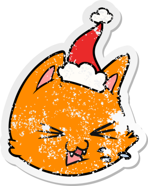 Tüküren el, bir insan tarafından çizilmiş Noel Baba şapkası takan kedi suratlı bir karikatür çizmiş.