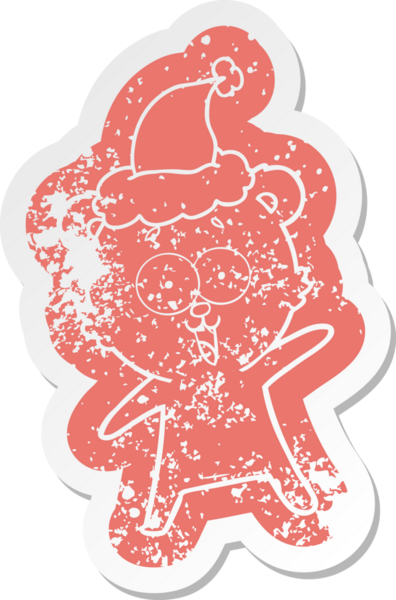 Gülen ayıcık, tuhaf çizgi film. Bir insan tarafından çizilmiş Noel Baba şapkasının çıkartması.