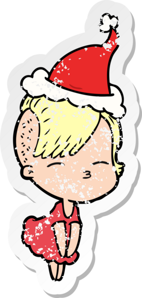 Bir insan tarafından çizilmiş Noel Baba şapkası giymiş, gözlerini kısmış bir kızın el yazısı.