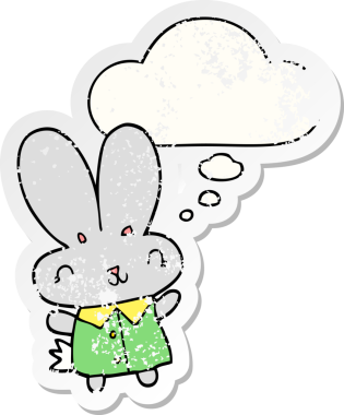 Sevimli çizgi film üzerinde düşünce kabarcığı olan küçük tavşan insan tarafından çizilmiş yıpranmış bir çıkartma.