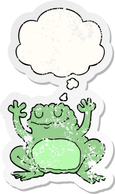 Düşünce baloncuğu olan karikatür kurbağası insan tarafından çizilmiş yıpranmış bir çıkartma.