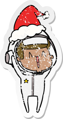 Mutlu el, bir astronotun Noel Baba şapkası giymiş bir insan tarafından çizilmiş üzgün çıkartması.