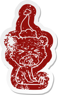 Kızgın, tuhaf çizgi film. Bir insan tarafından çizilmiş Noel Baba şapkası takan ayı çıkartması.