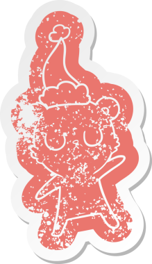 Huzurlu, tuhaf bir çizgi film. Bir insan tarafından çizilmiş Noel Baba şapkası takan ayı çıkartması.