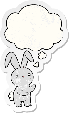Düşünce baloncuğu olan sevimli çizgi film tavşanı bir insan tarafından çizilmiş yıpranmış bir çıkartma.