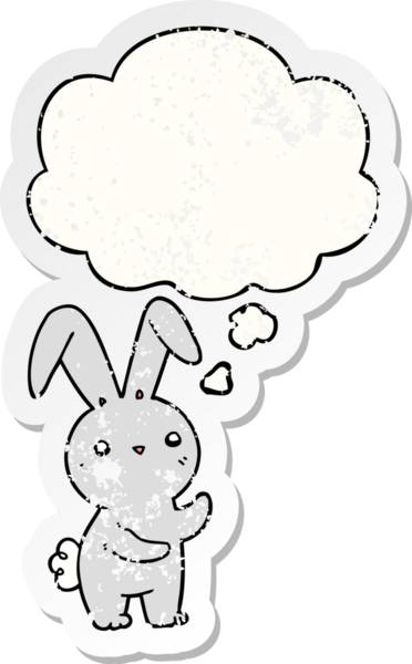 Düşünce baloncuğu olan sevimli çizgi film tavşanı bir insan tarafından çizilmiş yıpranmış bir çıkartma.