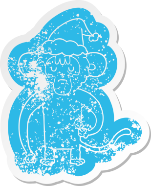 Bir insan tarafından çizilmiş Noel Baba şapkası takan bir maymunun garip bir karikatürü.