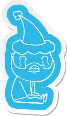 Bir insan tarafından çizilmiş Noel Baba şapkasıyla ağlayan sakallı bir adamın garip çizgi film çıkartması.