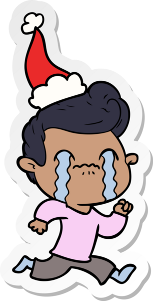 Bir insan tarafından çizilmiş Noel Baba şapkasıyla ağlayan bir adamın el yazısı.