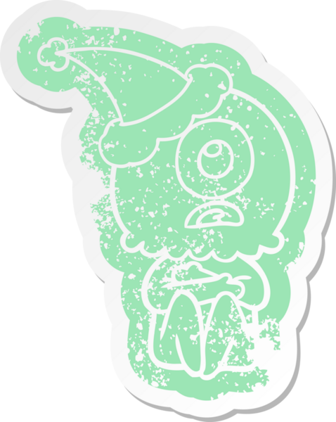 Bir insan tarafından çizilmiş Noel Baba şapkası giyen uzaylı bir Tepegöz 'ün garip bir karikatürü.