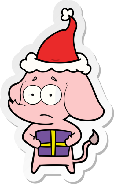 Bir insan tarafından çizilmiş Noel Baba şapkası giymiş belirsiz bir filin el yazısı.