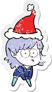 Bir insanın çizdiği Noel Baba şapkasıyla çömelmiş, dik dik bakan bir elf kızı çizilmiş.