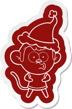 Şaşırmış bir maymunun insan tarafından çizilmiş Noel Baba şapkası.