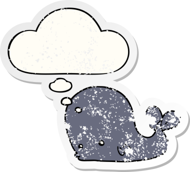 Düşünce baloncuğu olan karikatür balinası bir insan tarafından çizilmiş yıpranmış bir çıkartma.