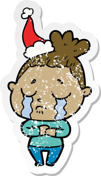 Bir insan tarafından çizilmiş, ağlayan, Noel Baba şapkası takan bir kadın.
