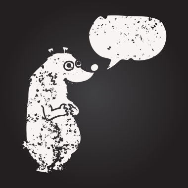 Tahta tebeşirle çizilmiş konuşma balonu bir insan tarafından çizilmiş.