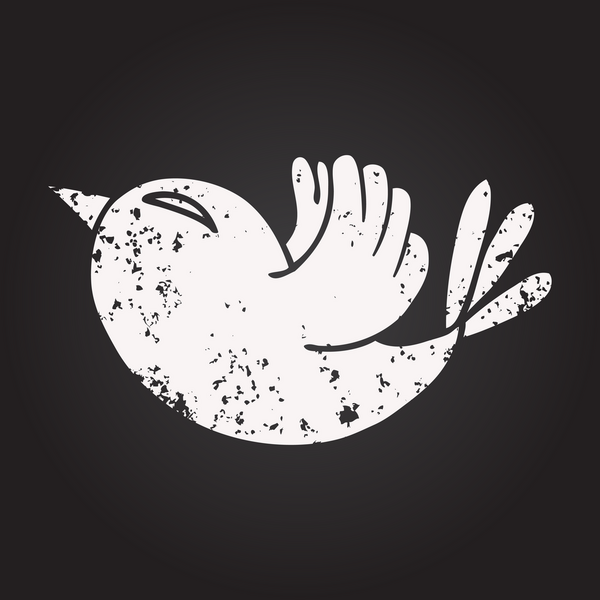 Karatahta tebeşirle insan tarafından çizilmiş kırmızı kuş.