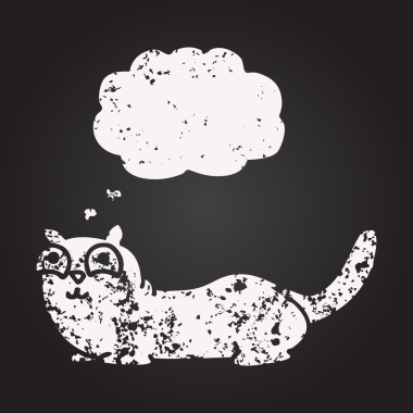 Tahta tebeşirle insan tarafından çizilmiş baloncuk çizgi film kedisi.