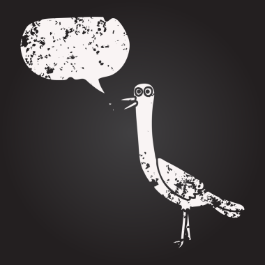 Tahta tebeşirle çizilmiş konuşma balonu karikatürü bir insan tarafından çizilmiş.