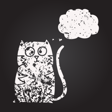 Tahta tebeşirle insan tarafından çizilmiş baloncuk çizgi film kedisi.