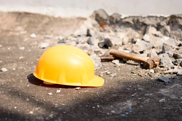 Safety Helmet in Construction Site. Yellow Hat. Safety Precautions Measures in Industrial workplace Background Concepts.