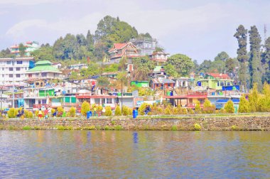 Mirik city Landscape view on the bank of Mirik Lake in sunset. Mirik Darjeeling West Bengal India South Asia Pacific December 28, 2022