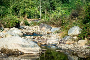 A small river creak flowing from Mountain Valley in a narrow winding passage. Rangbang river mountain valley Mirik West Bengal India South Asia Pacific