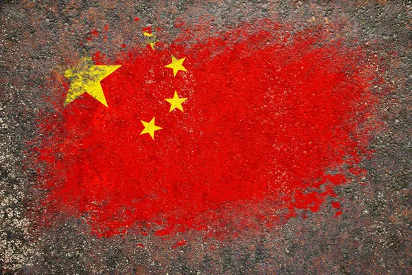 Flag of China. Flag is painted on a rusty surface. Rusty background. Creative background
