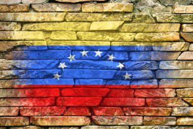 Venezuela bayrağı. Bayrak taştan bir duvara boyanmış. Taş zemin. Yapılandırılmış yaratıcı arkaplan