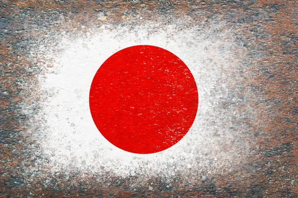 Flag of Japan. Flag painted on rusty surface. Rusty background. Textured creative background