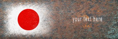 Japonya bayrağı. Paslı yüzeyde bayrak resmi. Paslı arka plan. Uzayı kopyala Yapılandırılmış yaratıcı arkaplan