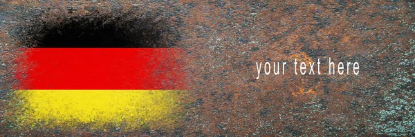 Flag of Germany. Flag painted on rusty surface. Rusty background. Space for text. Textured creative background