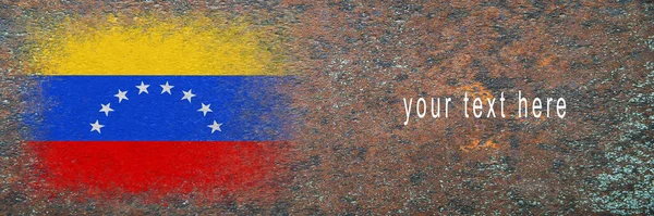 Flag of Venezuela. Flag painted on rusty surface. Rusty background. Space for text. Textured creative background