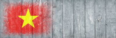 Vietnam bayrağı. Bayrak gri tahta bir yüzeye boyanmıştır. Ahşap arka plan. Hollywood yüzeyi. Uzayı kopyala Yapılandırılmış yaratıcı arkaplan
