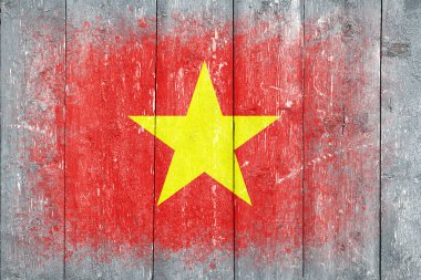 Vietnam bayrağı. Bayrak gri tahta bir yüzeye boyanmıştır. Ahşap arka plan. Hollywood yüzeyi. Uzayı kopyala Yapılandırılmış yaratıcı arkaplan