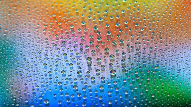Water drops. Abstract gradient backdrop Droplet texture. Multicolored gradient. Textured image. Small depth of field. Selective soft focus
