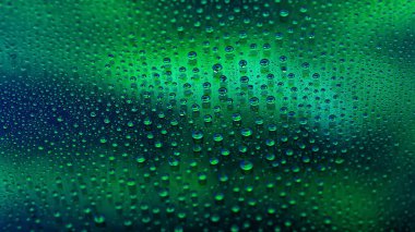 Water drops. Abstract gradient backdrop The texture of the drops. Green gradient. Textured image. Shallow depth of field. Selective soft focus