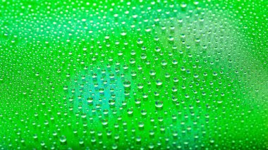 Water drops. Abstract gradient background. Droplet texture. Green gradient. Textured image. Shallow depth of field. Selective soft focus