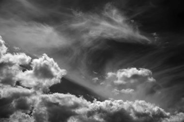 White cloud in the dark sky. Black and white dramatic sky template to create atmosphere