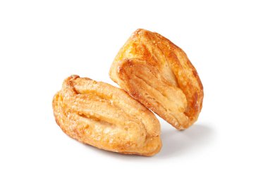 Cookies isolated on white. Biscuits are sprinkled with sugar. Crispy soft pastry. Soft focus