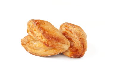 Cookies isolated on white. Biscuits are sprinkled with sugar. Crispy soft baked goods. Soft focus