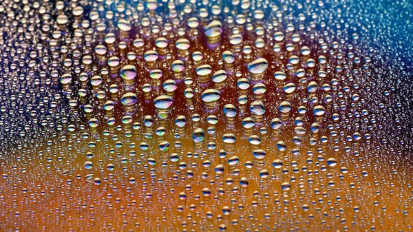 Wassertropfen Viele Tropfen Abstrakten Hintergrund Farbige Tropftextur Regenbogengefälle Schwer Strukturiertes — Stockfoto