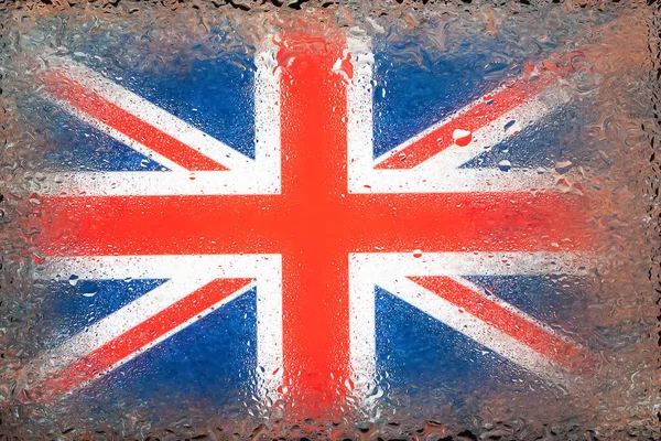 Flag of Britain. Flag of UK on the background of water drops. Flag with raindrops. Splashes on glass. Abstract background