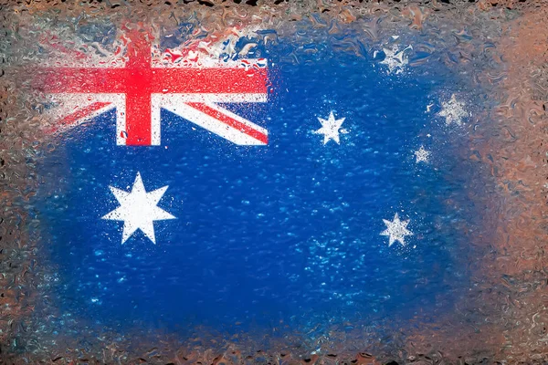 Flag of Australia. Flag of Australia on the background of water drops. Flag with raindrops. Splashes on glass. Abstract background