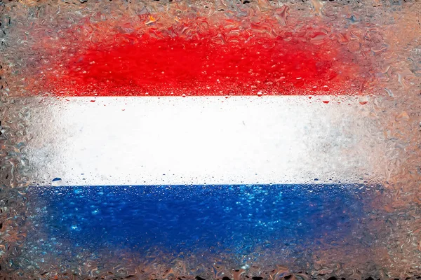 Flag of Netherlands. Flag of Netherlands on the background of water drops. Flag with raindrops. Splashes on glass. Abstract background