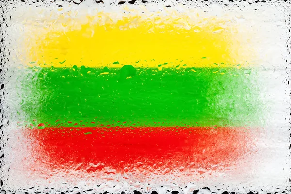 Lithuania flag. Flag of Lithuania on the background of water drops. Flag with raindrops. Splashes on glass. Abstract background