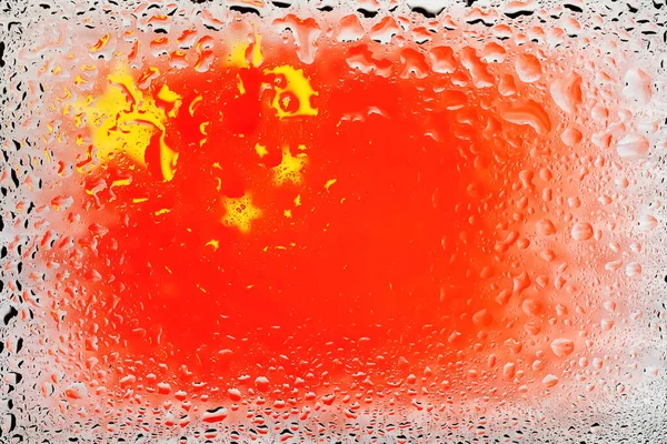 Flag of China. China flag on the background of water drops. Flag with raindrops. Splashes on glass. Abstract background
